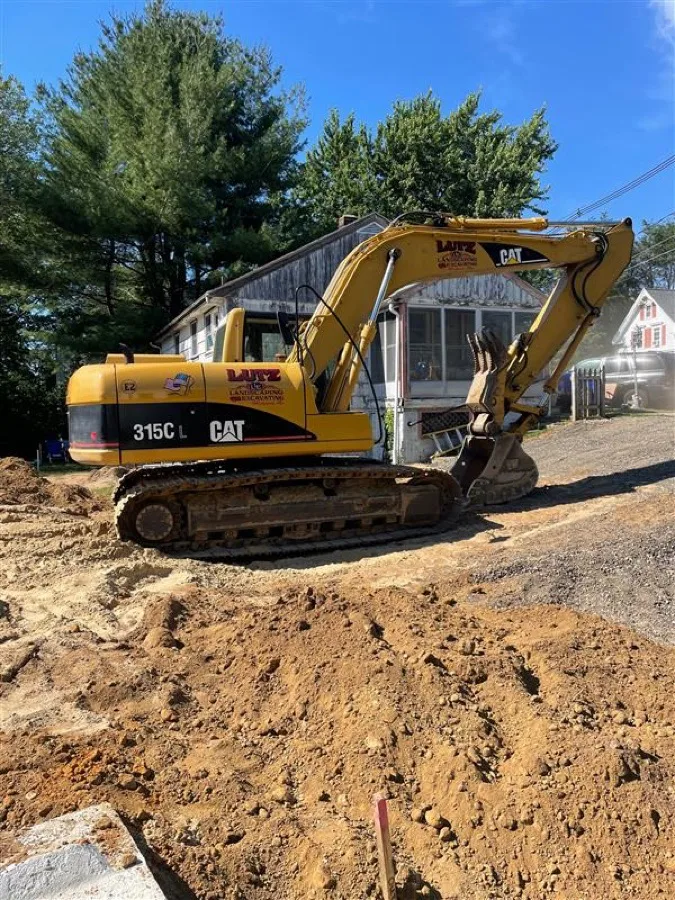 Mulch bed installation along a home's foundation